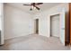 This bedroom features neutral walls and carpets with a ceiling fan at 1016 Laurens Mill Dr., Myrtle Beach, SC 29579