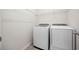 Laundry room with new washer and dryer and wire rack shelving at 1016 Laurens Mill Dr., Myrtle Beach, SC 29579