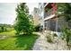 Beautiful condo exterior with lush landscaping and a tranquil setting at 1025 Plantation Dr. # 2413/2414, Little River, SC 29566