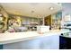 View of the kitchen featuring a long breakfast bar, bright lighting and lots of decorations at 1025 Plantation Dr. # 2413/2414, Little River, SC 29566