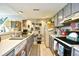 Kitchen area with great lighting and modern appliances including dishwasher, oven and refrigerator at 1025 Plantation Dr. # 2413/2414, Little River, SC 29566