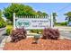 Community sign for Bay Tree Golf & Racquet and Golf Colony IX surrounded by manicured landscaping and mulch at 1025 Plantation Dr. # 2413/2414, Little River, SC 29566