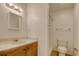 Bathroom with a vanity, mirror, and shower-tub combination, providing essential amenities at 1028 Duke St., Georgetown, SC 29440