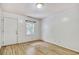 Clean bedroom with light wood floors, neutral walls, and a window for natural light at 1028 Duke St., Georgetown, SC 29440