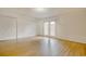 Spacious bedroom features gleaming hardwood floors, multiple closets, and double doors at 1028 Duke St., Georgetown, SC 29440