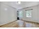 Bright bedroom with light wood floors, neutral walls, and exterior access at 1028 Duke St., Georgetown, SC 29440