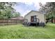 Rear exterior of home featuring a backyard with a deck and access to yard at 1028 Duke St., Georgetown, SC 29440