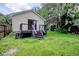 Rear exterior of home featuring a backyard with a deck and access to yard at 1028 Duke St., Georgetown, SC 29440