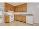 Well-equipped kitchen offering wooden cabinets, grey countertops, and modern appliances at 1028 Duke St., Georgetown, SC 29440