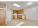 Bright kitchen features wood cabinets, white appliances, and a skylight to illuminate the space at 1028 Duke St., Georgetown, SC 29440