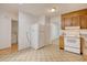 Spacious kitchen with linoleum floors, wooden cabinets, and modern appliances at 1028 Duke St., Georgetown, SC 29440