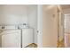 Practical laundry room features a washer, dryer, and easy access from the hallway at 1028 Duke St., Georgetown, SC 29440