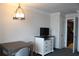 Living space includes a small dining table and a small dresser with TV at 1105 S Ocean Blvd. # 218, Myrtle Beach, SC 29577