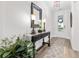 Elegant entryway with decorative table, stylish lamps, and a patterned rug at 117 Black Water Dr., Murrells Inlet, SC 29576