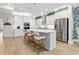 Bright kitchen featuring a quartz island, stainless appliances, and pendant lighting at 117 Black Water Dr., Murrells Inlet, SC 29576