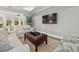 Cozy living room featuring tray ceilings, neutral walls, and comfortable seating at 117 Black Water Dr., Murrells Inlet, SC 29576