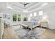 Spacious main bedroom boasts a tray ceiling, ample natural light, and neutral decor at 117 Black Water Dr., Murrells Inlet, SC 29576