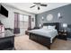 Comfortable bedroom with a serene ambiance, stylish decor, and ample natural light at 1301 Camlet Ln., Little River, SC 29566