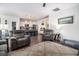 Bright and airy living room with an open layout, hardwood floors, and easy access to the kitchen at 1301 Camlet Ln., Little River, SC 29566