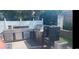 Stylish outdoor kitchen with stainless steel appliances and ample counter space for cooking and entertaining at 1301 Camlet Ln., Little River, SC 29566