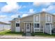 Charming townhouse with tidy landscaping, neutral tones, and inviting curb appeal at 1311 Turkey Ridge Rd. # A, Surfside Beach, SC 29575