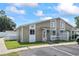 Charming townhome featuring neutral colors, well-manicured lawn and nearby parking for easy accessibility at 1311 Turkey Ridge Rd. # A, Surfside Beach, SC 29575