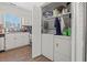 Convenient laundry area with a washer and dryer, located adjacent to the kitchen and sink at 1311 Turkey Ridge Rd. # A, Surfside Beach, SC 29575