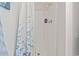 Shower with white and blue floral curtain at 1311 Turkey Ridge Rd. # A, Surfside Beach, SC 29575