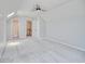 Bright bedroom with vaulted ceiling, ceiling fan, and plush neutral carpet at 1409 Ashwood Circle, Surfside Beach, SC 29575