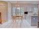 Cozy eat-in kitchen area with a window view, adjacent to the kitchen counter at 1409 Ashwood Circle, Surfside Beach, SC 29575