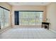 Inviting sunroom with tiled floors, large windows offering serene views at 1409 Ashwood Circle, Surfside Beach, SC 29575