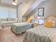 Bedroom featuring three twin beds, a ceiling fan, and a window at 145 Hartland Dr. # 4-E, Myrtle Beach, SC 29572