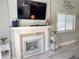 Elegant fireplace featuring classic mantel, decorative accents, and stylish decor, enhancing the room's ambiance at 145 Hartland Dr. # 4-E, Myrtle Beach, SC 29572