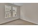Bedroom with two windows and natural light at 1534 Breakwater Dr., Little River, SC 29566