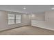 Bonus room with carpet floor and windows showcasing the exterior neighborhood at 1534 Breakwater Dr., Little River, SC 29566