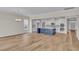Spacious open-concept kitchen with a large island, stainless steel appliances, and bright white cabinetry at 1534 Breakwater Dr., Little River, SC 29566