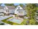 Aerial view of a home with a pool, backyard, and surrounding green space at 1718 26Th Ave. N, North Myrtle Beach, SC 29582
