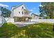 Backyard with a pool, privacy fence, patio, and outdoor living space at 1718 26Th Ave. N, North Myrtle Beach, SC 29582