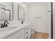 Bathroom with double sink vanity, modern fixtures, and a glass shower at 1718 26Th Ave. N, North Myrtle Beach, SC 29582