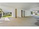 Spacious carport featuring white ceiling and beams offering ample space and functionality at 1718 26Th Ave. N, North Myrtle Beach, SC 29582