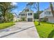 Exterior of a two-story home with a driveway, lawn, and curb appeal at 1718 26Th Ave. N, North Myrtle Beach, SC 29582