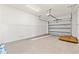 A two car garage with a painted interior and paneled walls at 1718 26Th Ave. N, North Myrtle Beach, SC 29582