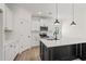 Stylish kitchen with an island, stainless steel appliances, and white subway tile backsplash at 1718 26Th Ave. N, North Myrtle Beach, SC 29582