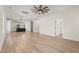 Open-concept living area featuring sleek flooring and seamless transition to the kitchen at 1718 26Th Ave. N, North Myrtle Beach, SC 29582