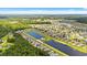 Community aerial showcasing numerous houses and community lakes for outdoor recreation at 276 Whipple Run Loop, Myrtle Beach, SC 29588