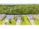 Aerial view of houses with green lawns showcasing a desirable residential neighborhood at 276 Whipple Run Loop, Myrtle Beach, SC 29588