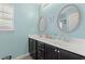 Bathroom featuring a double sink vanity with framed mirrors and ample counter space at 276 Whipple Run Loop, Myrtle Beach, SC 29588