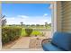 A cozy front porch provides seating and views of the lake and neighborhood at 276 Whipple Run Loop, Myrtle Beach, SC 29588