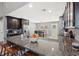 Kitchen featuring dark wood cabinets, granite countertops, bar stool seating and stainless steel appliances at 276 Whipple Run Loop, Myrtle Beach, SC 29588