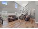 Spacious living room featuring a staircase, large windows, and modern decor at 276 Whipple Run Loop, Myrtle Beach, SC 29588